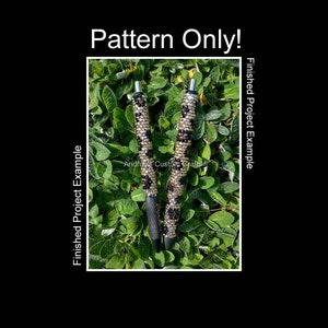 May include: Two black pens with a black and gold bead pattern. The pens are on a bed of green leaves. The text "Pattern Only!" is at the top of the image. The text "Finished Project Example" is on the right side of the image.