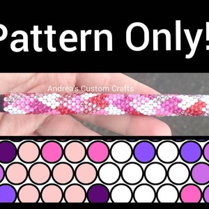 May include: A pattern for a pink, white, and red rhinestone pen. The pattern is made up of circles in different shades of pink, white, and purple.
