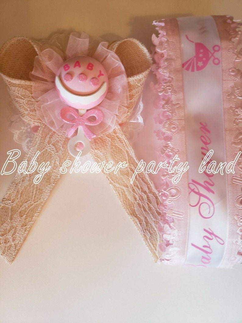 Baby Shower decoration for girl Mom To Be It/'s a Girl Sash Pink With Rattle Ribbon and Corsage