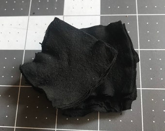 Tela carbonizada, iniciador de fuego
