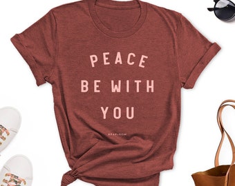 La paix soit avec vous - t-shirt catholique, tee-shirt catholique, tee-shirt chrétien, tee-shirts catholiques, vêtements catholiques