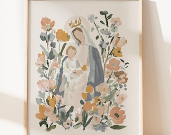 May include: Framed art print featuring a watercolor illustration of a religious figure and child surrounded by flowers. The artwork has a soft color palette of peach, yellow, and blue, with a light wooden frame.
