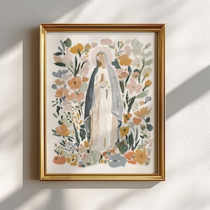 May include: Watercolor art print in a gold frame. The artwork depicts a figure in a white and blue robe, surrounded by colorful flowers in shades of peach, yellow, and green. The art has a soft, painterly style, suitable for home decor.