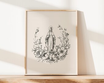 May include: Framed art print featuring a black and white sketch of a religious figure, surrounded by a floral wreath. The artwork is displayed in a light-colored wooden frame, suitable for home decor.