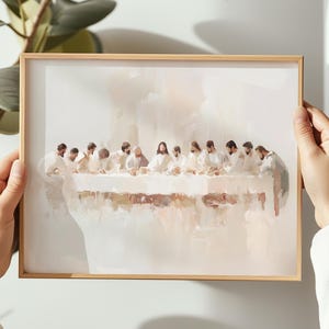 May include: A watercolor painting depicting the Last Supper, featuring Jesus and his disciples gathered around a table. The painting is done in soft, muted tones of white, beige, and brown, creating a serene and contemplative atmosphere.