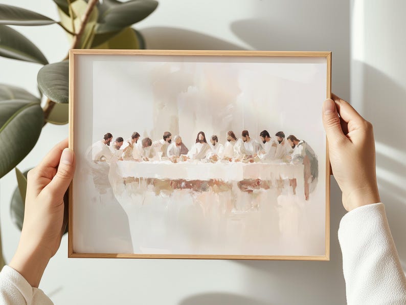 May include: A watercolor painting depicting the Last Supper, featuring Jesus and his disciples gathered around a table. The painting is done in soft, muted tones of white, beige, and brown, creating a serene and contemplative atmosphere.