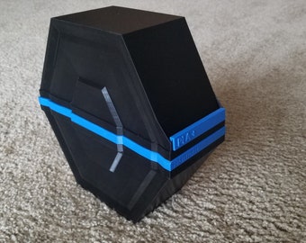 Caja de almacenamiento de filamentos (tapacubos)