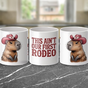Capybara Mug, Rodeo Mug, Funny Animal Mug, Western Mug, This Aint Our First Rodeo Mug, Unique Mug, Gift Mug
