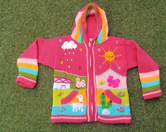 Pull en laine péruvienne pour enfants cardigan avec détails brodés Fucsia