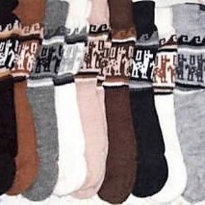 May include: A set of ten pairs of alpaca wool socks with colorful geometric patterns. The socks are in various colors, including black, brown, gray, and white.