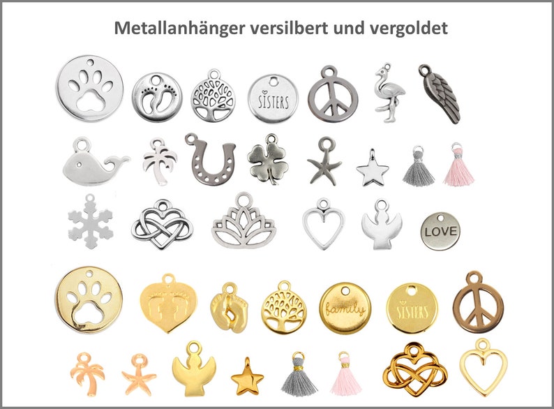 May include: A collection of silver and gold metal charms featuring various designs, including paw prints, a tree, a peace sign, a flamingo, a horseshoe, a clover, a star, a snowflake, a heart, a dove, a palm tree, a starfish, a tassel, and the word "LOVE".