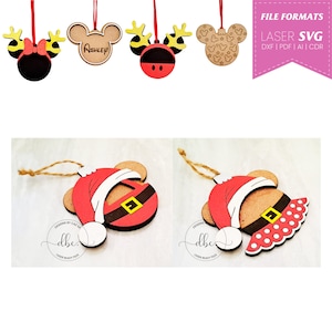 Peut inclure: Ensemble de cinq décorations de Noël en bois découpées au laser représentant les personnages de Mickey Mouse et Minnie Mouse. Les décorations sont décorées de couleurs rouge, blanc et noir. Les décorations sont prêtes à être personnalisées avec des noms ou d'autres motifs.