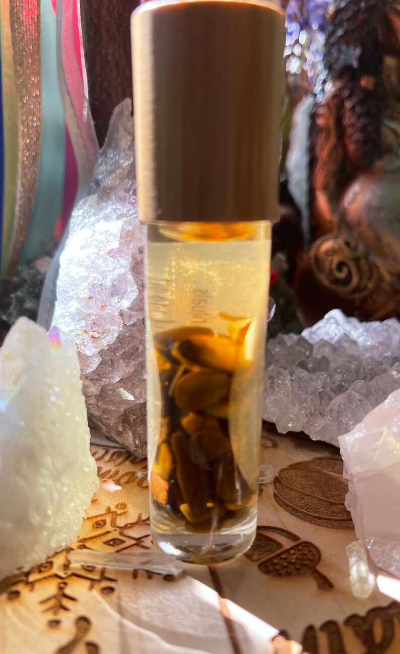 Hand Blended Crystal Infused Protection Oil/ Manifestation Oil/Essential Oil Roll on / Crystal Infused Oil / Ritual Oil/ Protective Crystals Tigers Eye