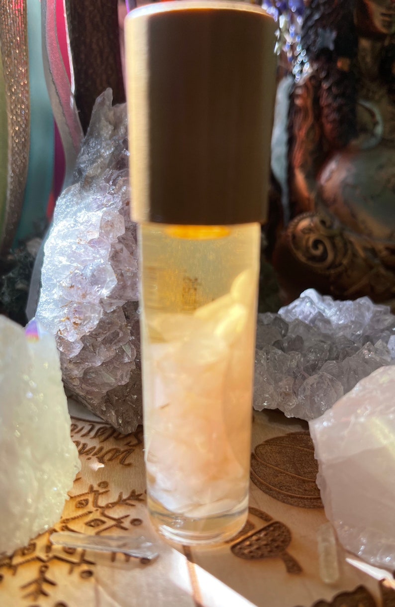 Hand Blended Crystal Infused Protection Oil/ Manifestation Oil/Essential Oil Roll on / Crystal Infused Oil / Ritual Oil/ Protective Crystals Rose Quartz