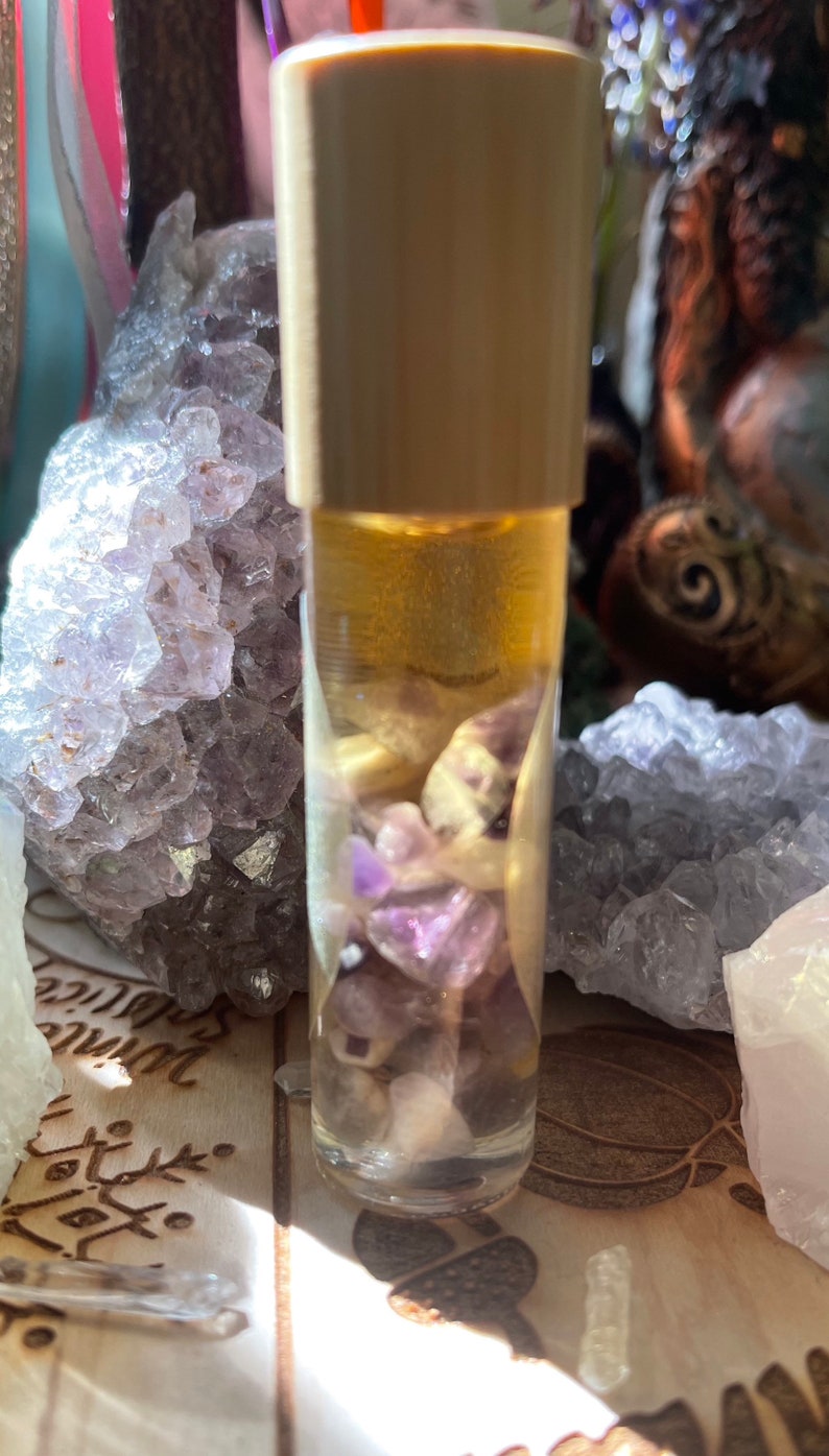 Hand Blended Crystal Infused Protection Oil/ Manifestation Oil/Essential Oil Roll on / Crystal Infused Oil / Ritual Oil/ Protective Crystals Amethyst