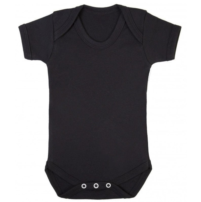 May include: A solid black baby bodysuit with short sleeves and a round neckline. The bottom of the bodysuit has three white snaps for easy closure. The garment is made of a soft, opaque fabric.