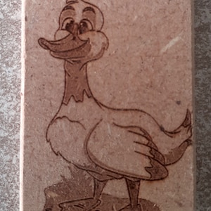 magnet laser engraved on wood of the duck and these small
