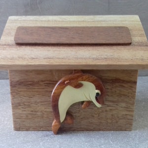 wooden dolphin piggy bank, customizable with your first name