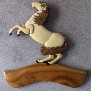 white prancing horse door plate in varnished wood customizable with your first name offered