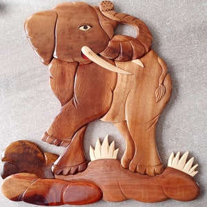 large wooden elephant wall plaque