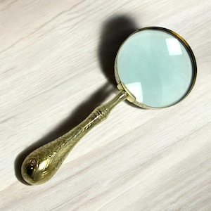 Vintage Style Magnifying Glass: Elegant Brass Handle Decor Accent
