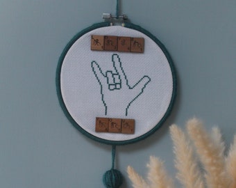 British Sign Language cross stitched I love You sign