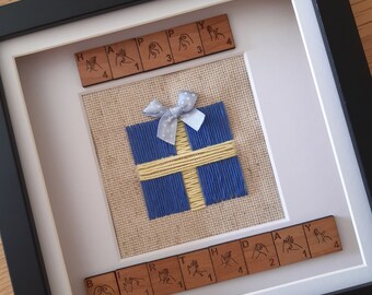 British Sign Language 'Happy Birthday' Scrabble tile frame with gift decoration.