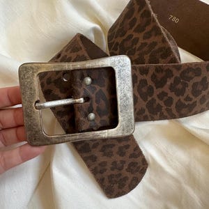 Vintage brown leopard print leather belt with wide distressed silver buckle  – size S-M