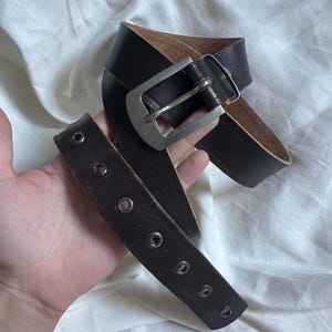 Vintage dark brown genuine leather grommet belt with silver buckle – size L-XL (91–104 cm waist)