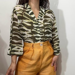 Vintage semi-sheer viscose blouse with stylized jungle print – size S-M