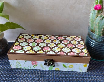 Handcrafted decorative wooden box with small yellow and pink flowers, one-of-a-kind piece