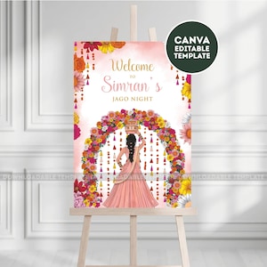 May include: A pink and floral welcome sign on an easel. The sign reads "Welcome to Simran's Jago Night" with a watercolor illustration of a woman carrying a pot on her head, framed by a floral arch.