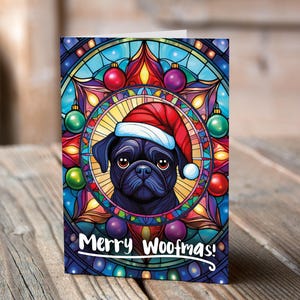 Carte de Noël Carlin noir dans un bonnet de Noel
