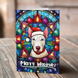 Carte de Noël Bull terrier dans un bonnet de Noel