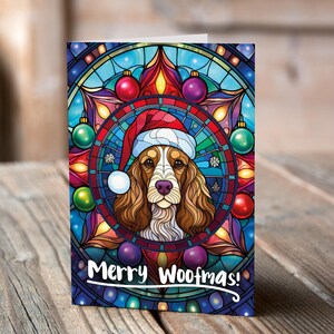Carte de Noël Cocker dans un bonnet de Noel