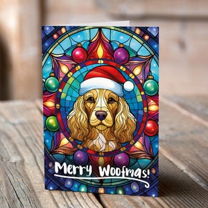 Carte de Noël Cocker doré dans un bonnet de Noel