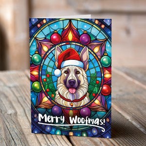 Carte de Noël Berger allemand blanc dans un bonnet de Noel