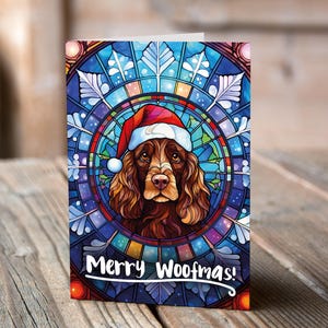 Carte de Noël Cocker spaniel chocolat dans un bonnet de Noel