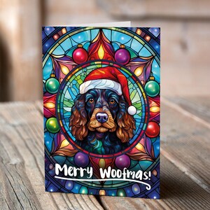 Carte de Noël Cocker noir dans un bonnet de Noel