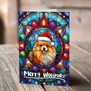 Carte de Noël Poméranie dans un bonnet de Noel