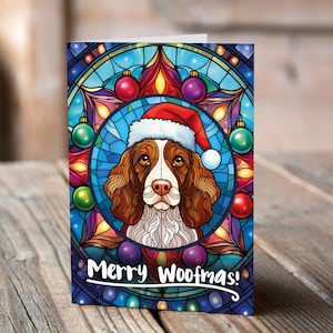 Carte de Noël Springer gallois dans un bonnet de Noel