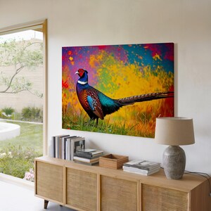 May include: A colourful painting of a pheasant with a long tail standing in a field of grass. The background is a vibrant mix of yellow, blue, green, and red.