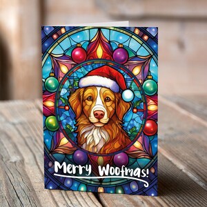 Carte de Noël Duck Tolling Retriever de la Nouvelle-Écosse dans un bonnet de Noel