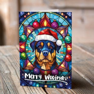 Carte de Noël Rottweiler dans un bonnet de Noel