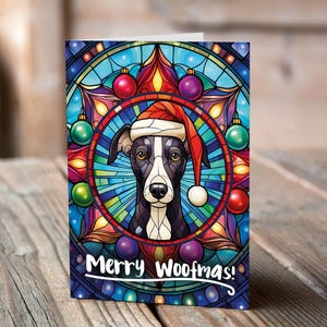 Biglietto di Natale con Whippet bianco e nero in un cappello da Babbo Natale