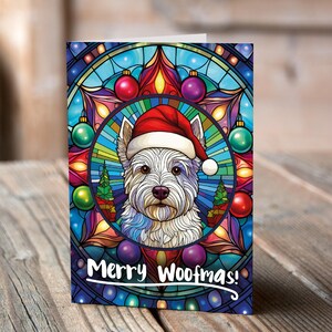 Carte de Noël West Highland Terrier dans un bonnet de Noel