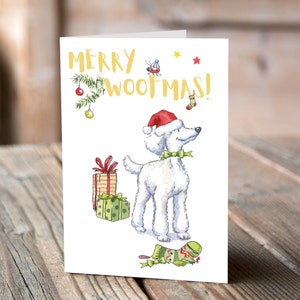 Cartolina di Natale bianca del barboncino
