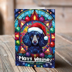 Carte de Noël Caniche noir dans un bonnet de Noel