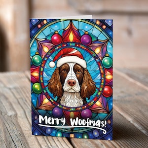 Carte de Noël Springer Spaniel dans un bonnet de Noel