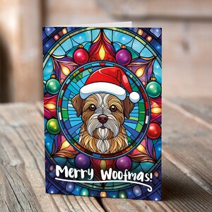 Carte de Noël Border terrier dans un bonnet de Noel